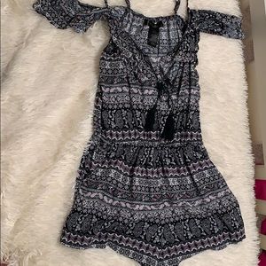 A cute printed romper that has never been worn!!